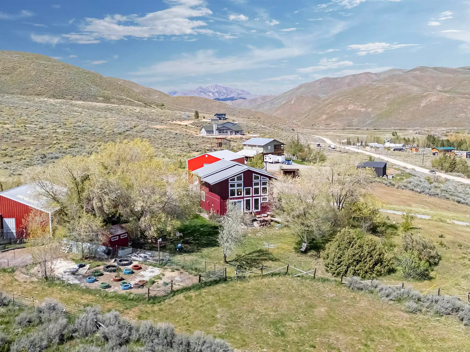 Red barn-style home with mountain views near Fairfield, Idaho